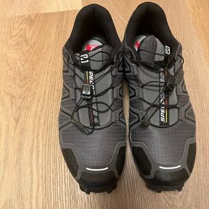 Salomon hiking shoes speed cross 4  size 9.  Like new